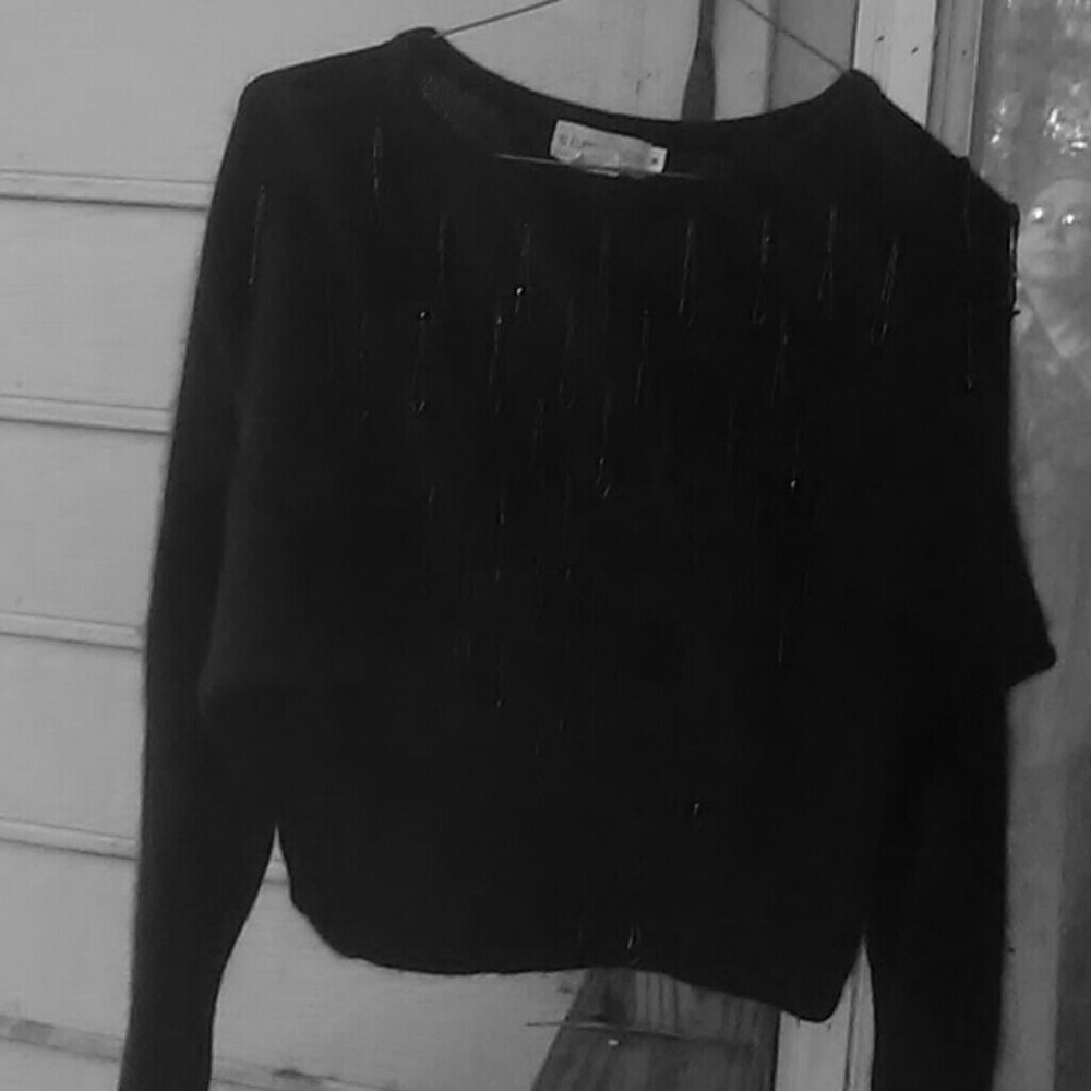 Black fuzzy Semplice sweater with beaded loops